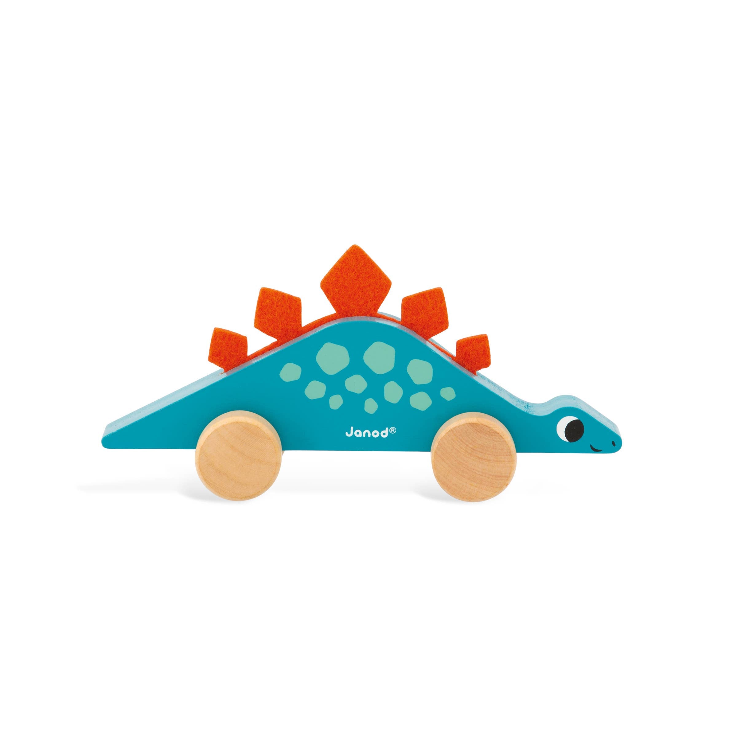 Toy dinosaur with wooden wheels on a white background
