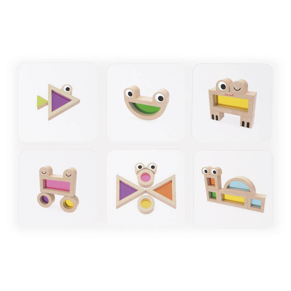 Set of colorful wooden toys with various shapes and designs on a white background