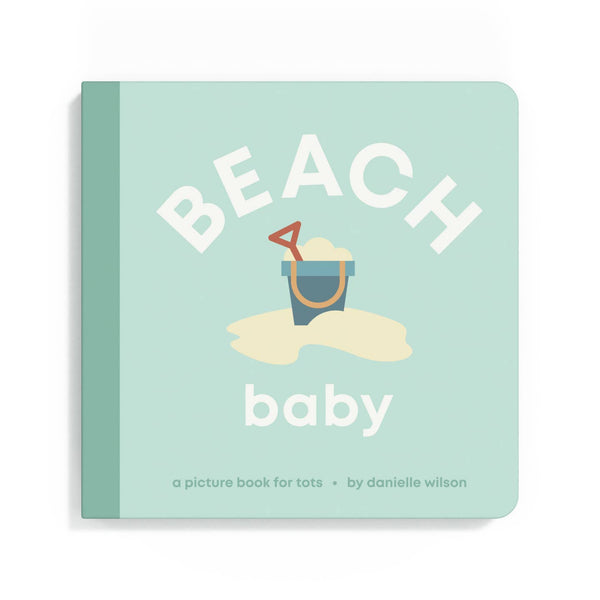 Book titled 'Beach Baby' with a sand bucket and shovel illustration on a light green background