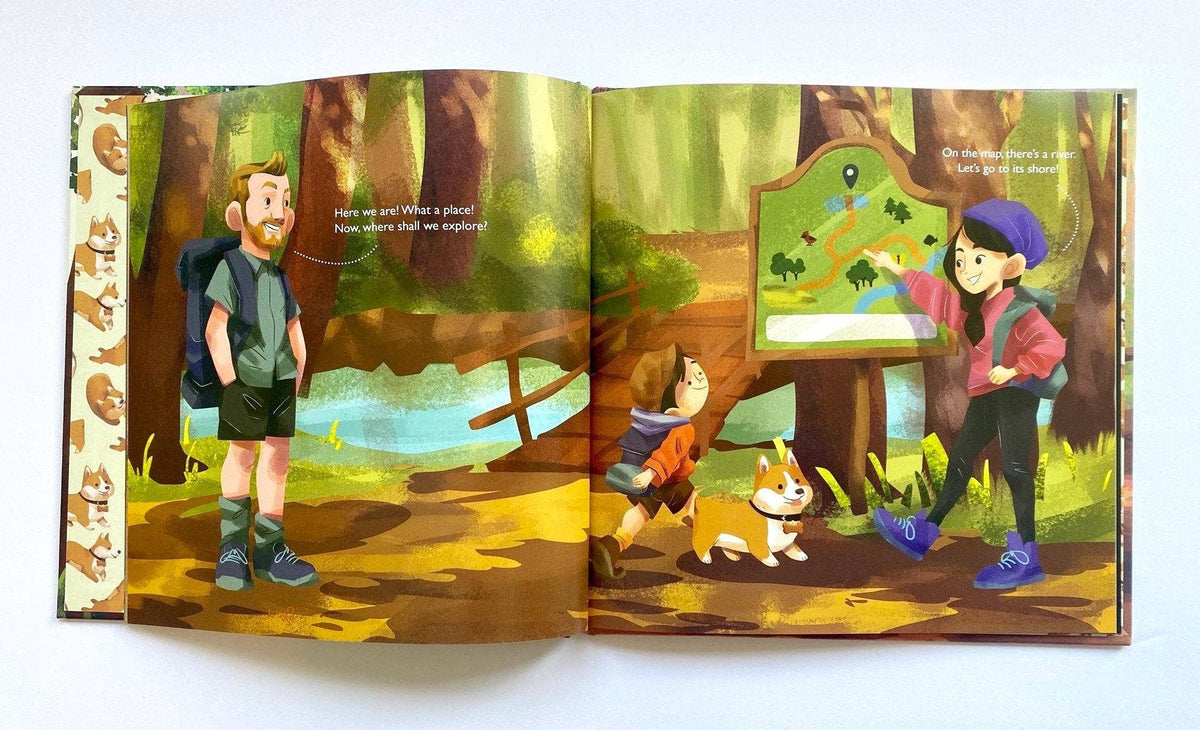 An open children's picture book showing two illustrated forest scenes with characters and text bubbles. The left page depicts a bearded man in outdoor gear standing in a forest, and the right page shows a child, an adult, and a dog looking at a map in a woodland setting.