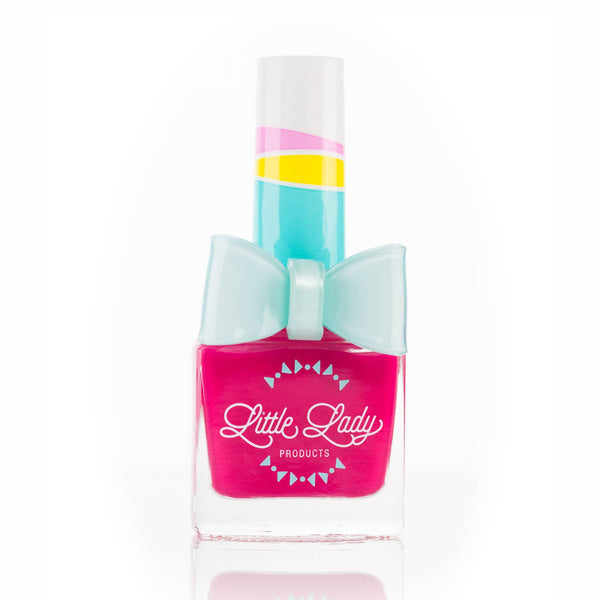 Pink nail polish bottle with a bow and 'Little Lady Products' branding on a white background