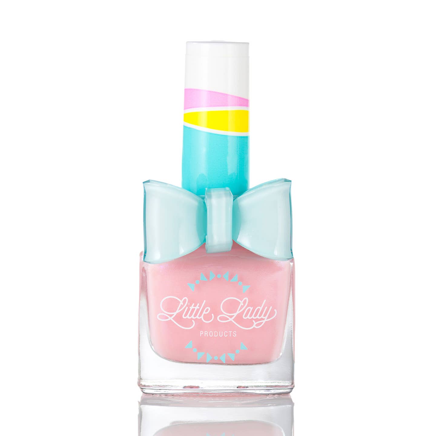 A bottle of Little Lady Products nail polish in a pastel pink shade, featuring a decorative light blue bow on the bottle and a colorful striped cap.