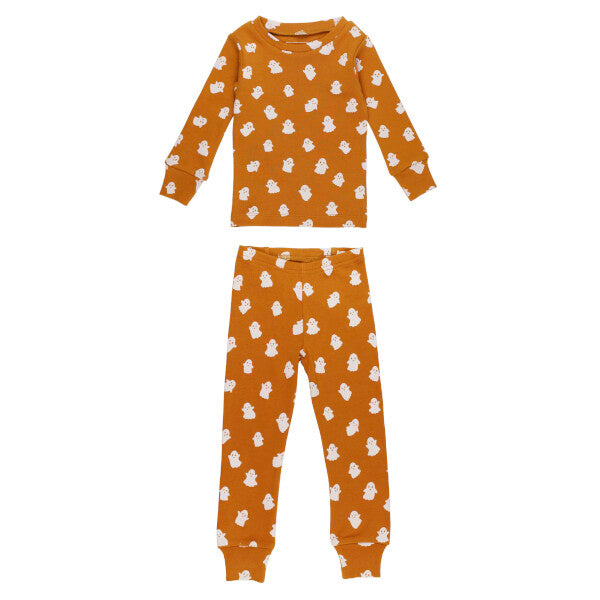 Children's pajama set with white ghost pattern on brown background