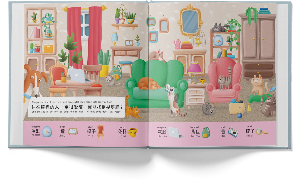 An open children's book spread showing a colorful cartoon living room scene with multiple cats and furniture, plus a pink bottom strip with labeled objects in Chinese and English.
