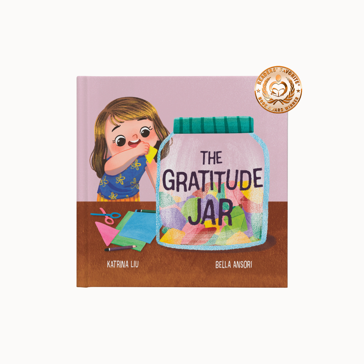 Children's book cover titled "The Gratitude Jar" by Bella Ansori, featuring an illustration of a girl adding a yellow item to a large gratitude jar on a table. The book is shown against a light gray background with a gold "Reader's Favorite" badge in the top right corner.