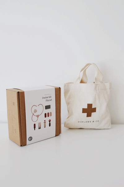 Doctor kit box and tote bag with a cross logo on a white background
