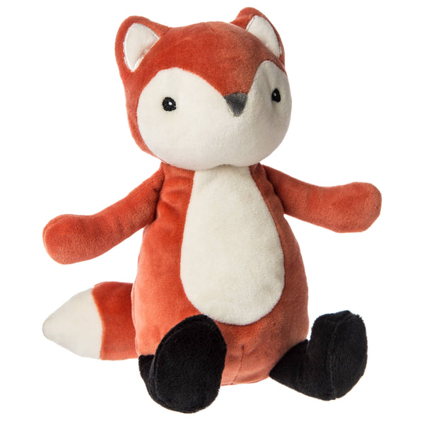 Plush fox toy on a white background