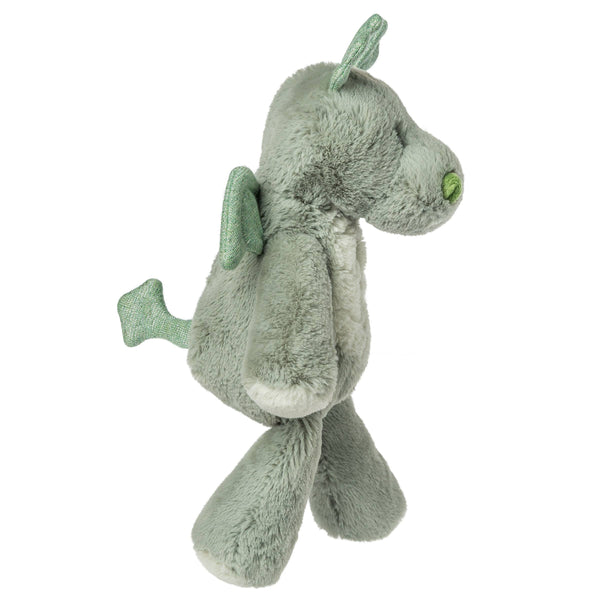 Green plush dragon toy on a white background