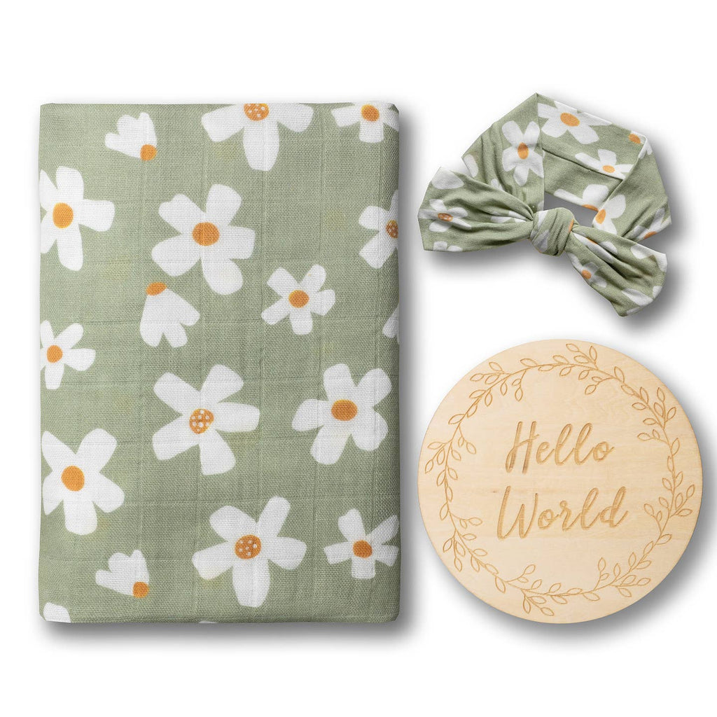 Baby items set with floral patterned blanket, headband, and 'Hello World' plaque on a white background