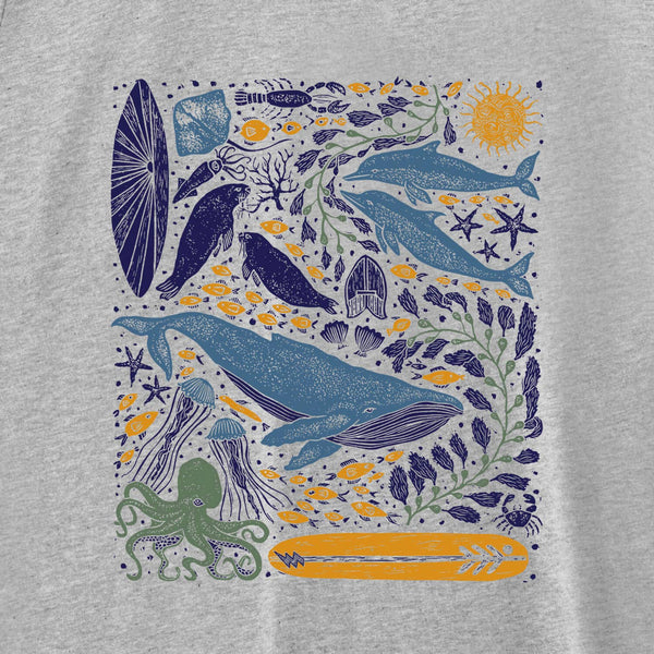 Gray t-shirt with blue whales, octopus, and sea creatures on a gray background