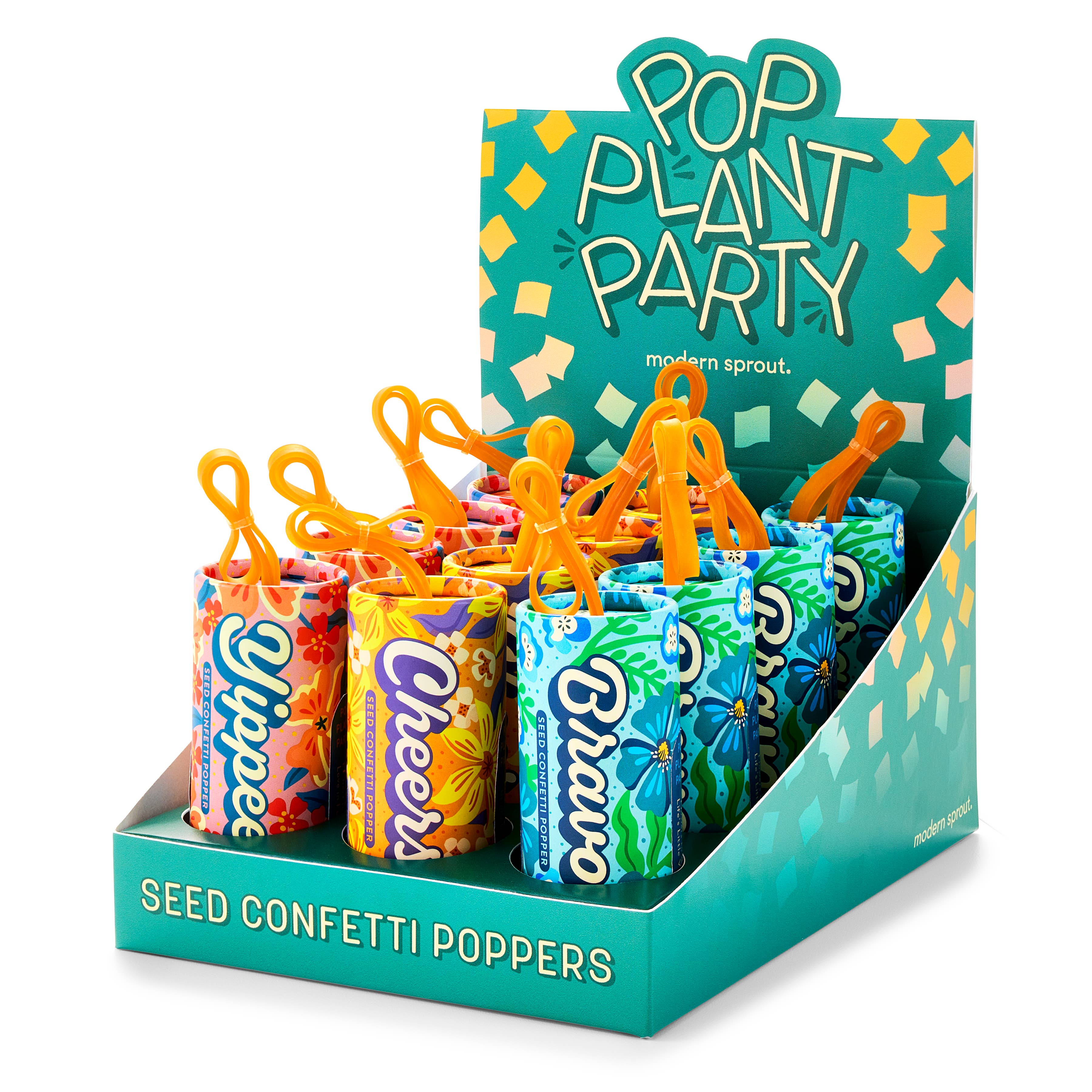 Display of 'Pop Plant Party' seed confetti poppers with colorful packaging and orange plant figures.