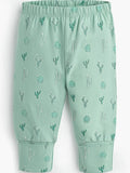 Green pants with cactus pattern on a plain background