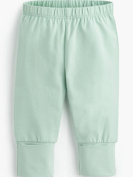 Light green pants on a white background