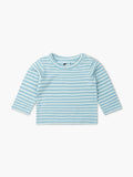 Blue and white striped long-sleeve shirt on a light beige background
