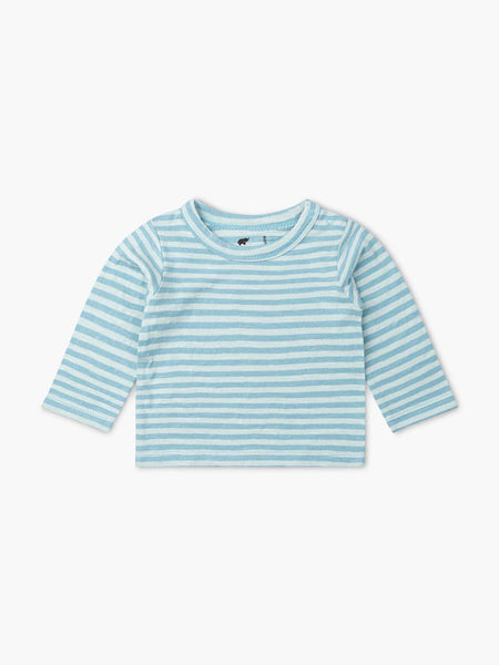 Blue and white striped long-sleeve shirt on a light beige background