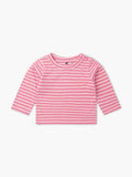 Pink and white striped long-sleeve shirt on a light gray background
