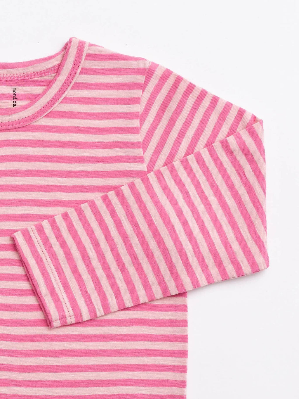 Pink and white striped long-sleeve shirt on a white background