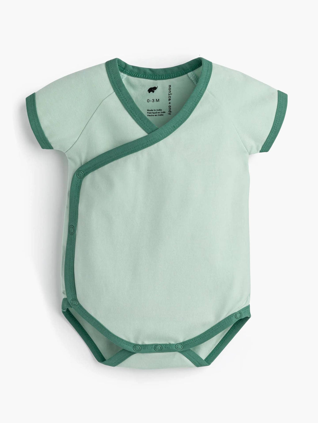 Green baby bodysuit with green trim on a white background
