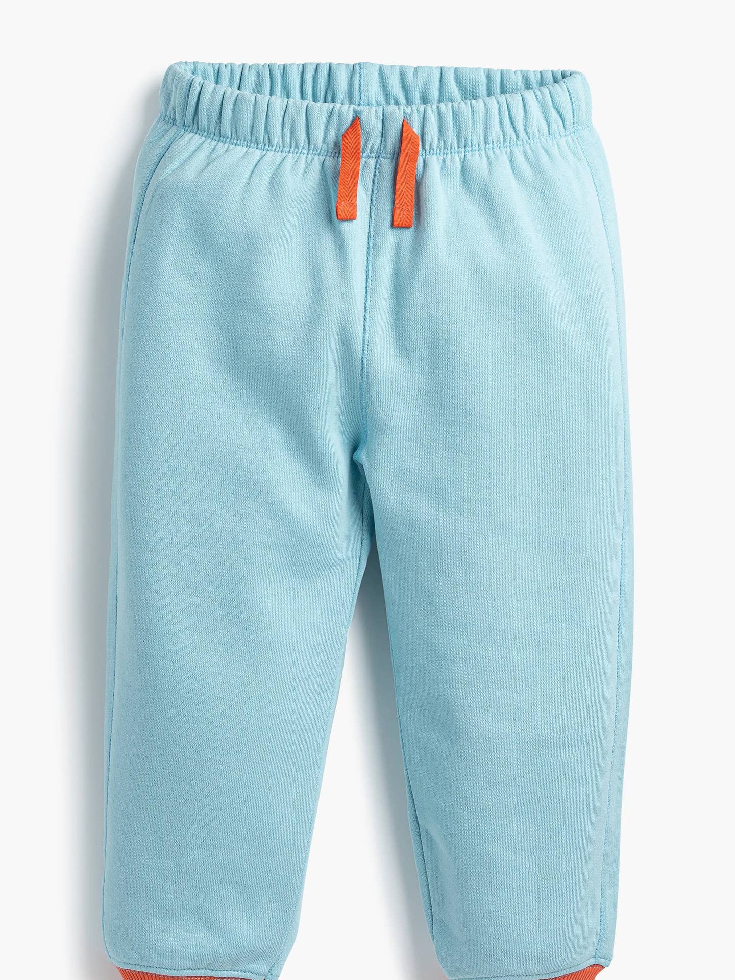 Light blue pants with orange accents on a white background