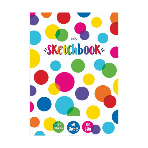 Sketchbook with colorful polka dot design on a white background