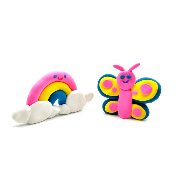 Two colorful clay models of a butterfly and a rainbow on a white background