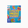 Ooly Razzle Dazzle DIY Gem Sticker Kit box, featuring a bright blue cover with colorful illustrations of a rainbow, sunglasses, a cat, a roller skate, and a dinosaur.