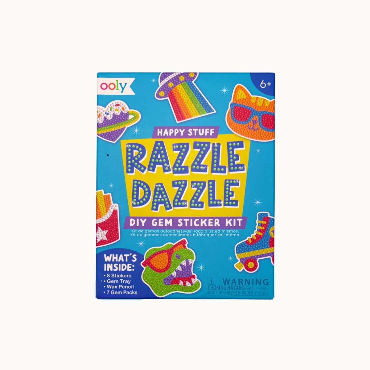 Ooly Razzle Dazzle DIY Gem Sticker Kit box, featuring a bright blue cover with colorful illustrations of a rainbow, sunglasses, a cat, a roller skate, and a dinosaur.