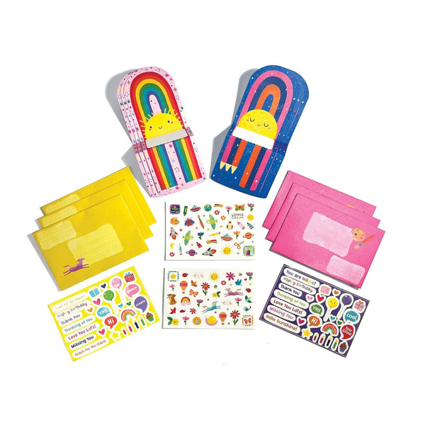 Colorful stationery items including notebooks, stickers, and envelopes on a white background