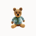 A crocheted teddy bear toy wearing a blue and green striped sweater, centered on a plain light gray background.