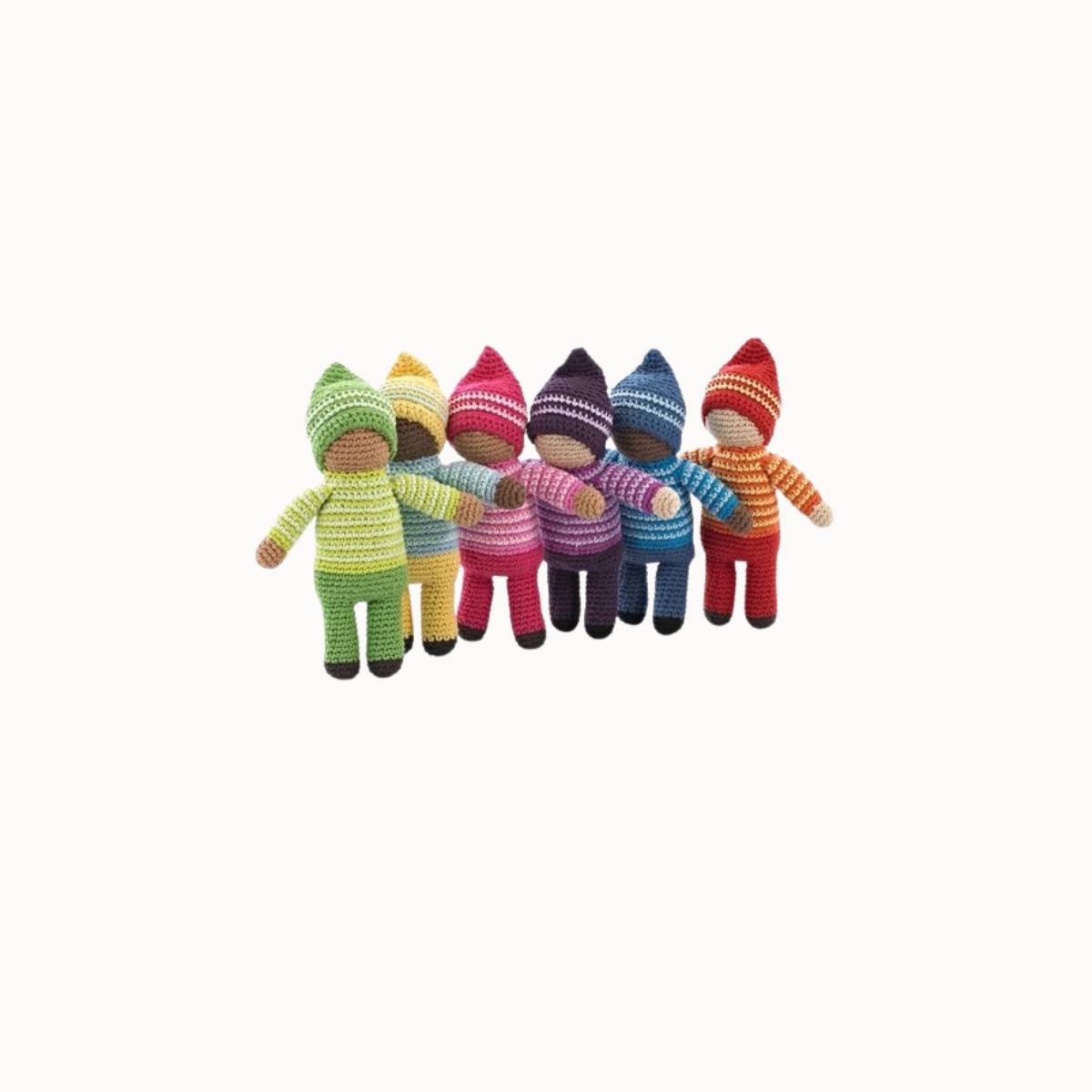 Six colorful crocheted doll figures standing in a row, each wearing a striped knit outfit in different colors including green, yellow, pink, purple, blue, and red, on a plain light background.