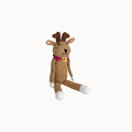 A handmade crocheted stuffed toy reindeer in brown yarn with white accents on its paws and feet, a pink collar, and a yellow bell, set against a plain off-white background.