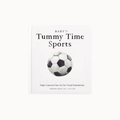 A baby's tummy time sports book with a white cover, featuring a black and white soccer ball illustration and the title 'Baby's Tummy Time Sports' in black text.