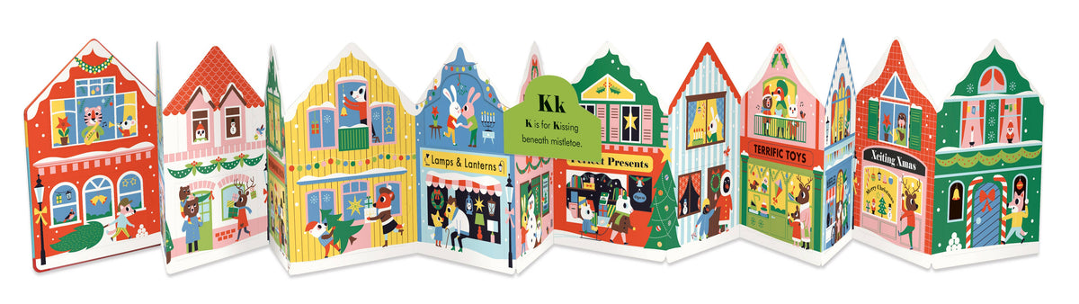 A colorful children's book or booklet featuring a row of illustrated houses and storefronts on the cover, photographed against a plain white background.