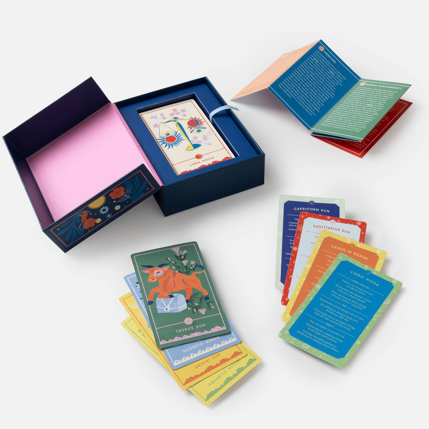 Colorful tarot cards with a blue box on a white background