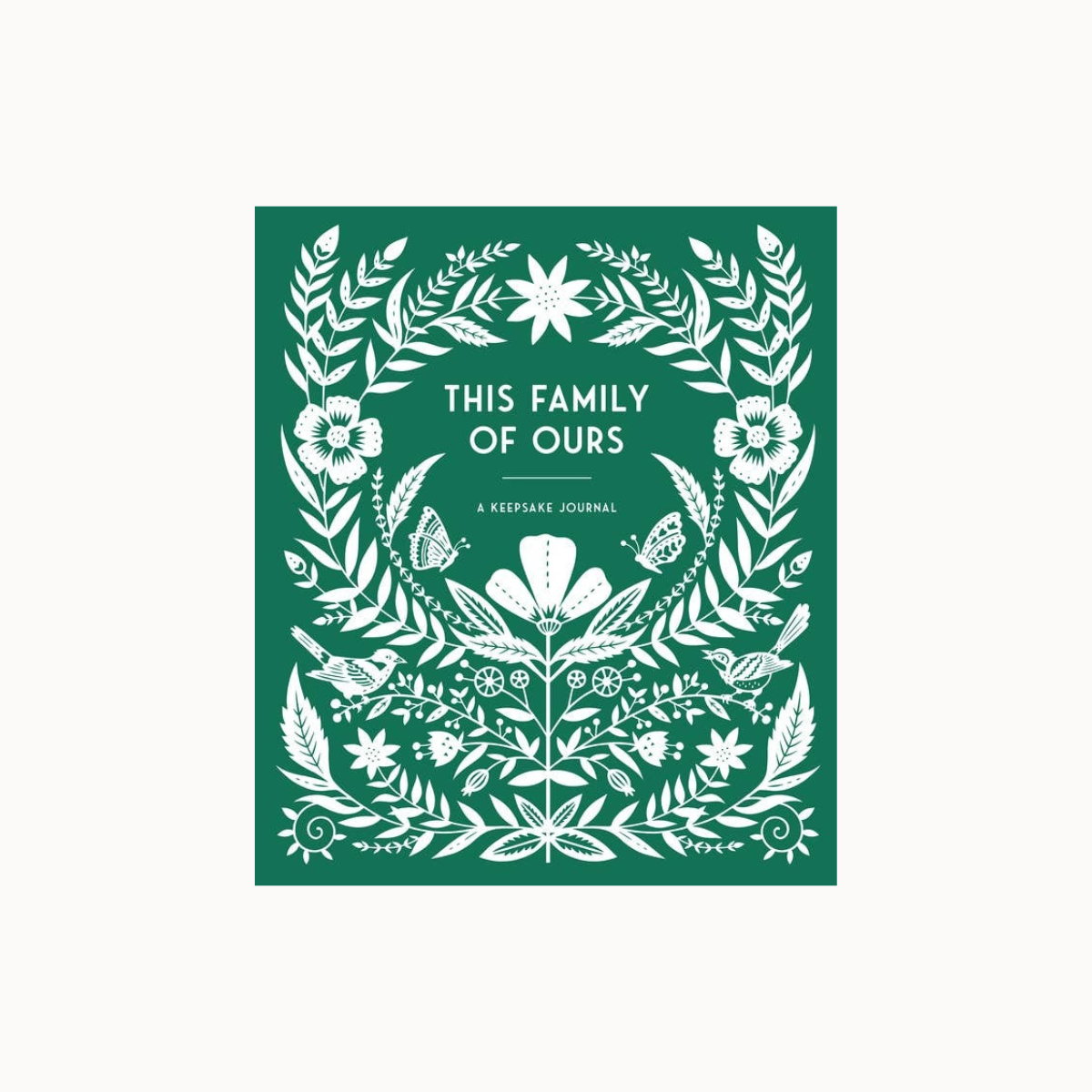 A square green journal cover with white floral and botanical illustrations and the title 'THIS FAMILY OF OURS' centered on a light gray background.