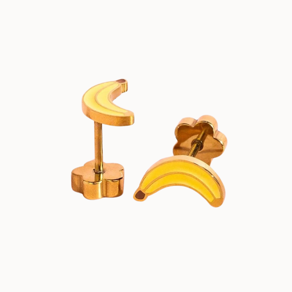 Gold banana-shaped earrings on a white background