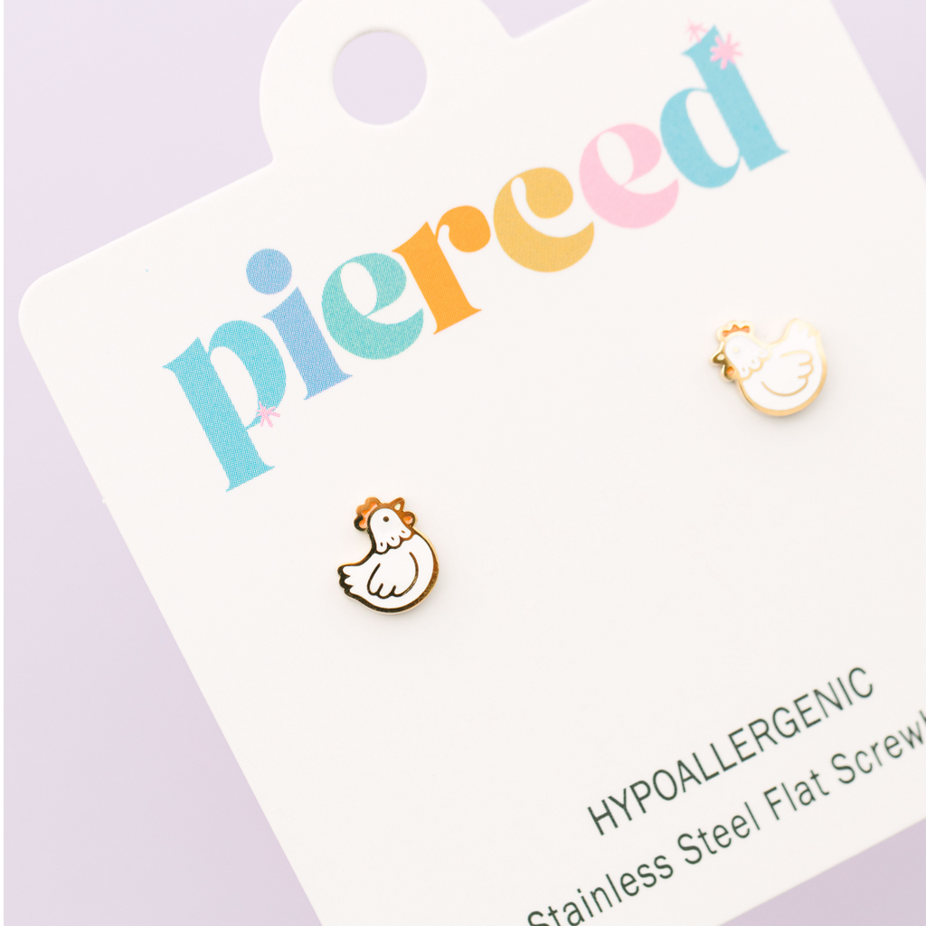 Earring card with 'pierceed' branding and two small earrings on a light purple background