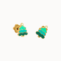 A pair of gold-plated stud earrings shaped like Christmas trees with green and teal enamel fillings, shown on a plain off-white background.