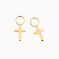 A pair of gold-plated cross stud earrings with a flat, polished cross design and a circular top loop, shown on a clean off-white background.
