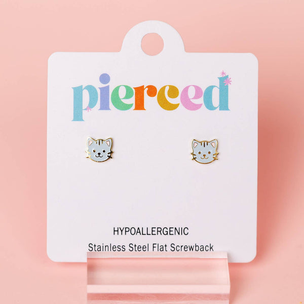 Cat-shaped earrings on a 'pierceed' branded card with a pink background