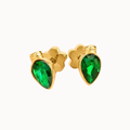 A pair of gold stud earrings featuring faceted green teardrop-shaped gemstones in gold settings, shown against a plain white background.
