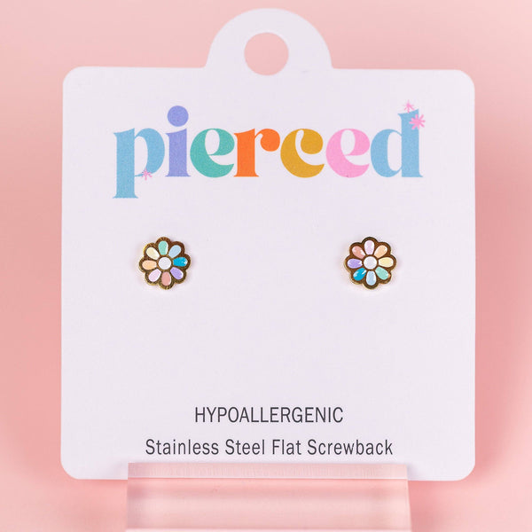 Pair of colorful flower earrings on a 'pierceed' branded card against a pink background