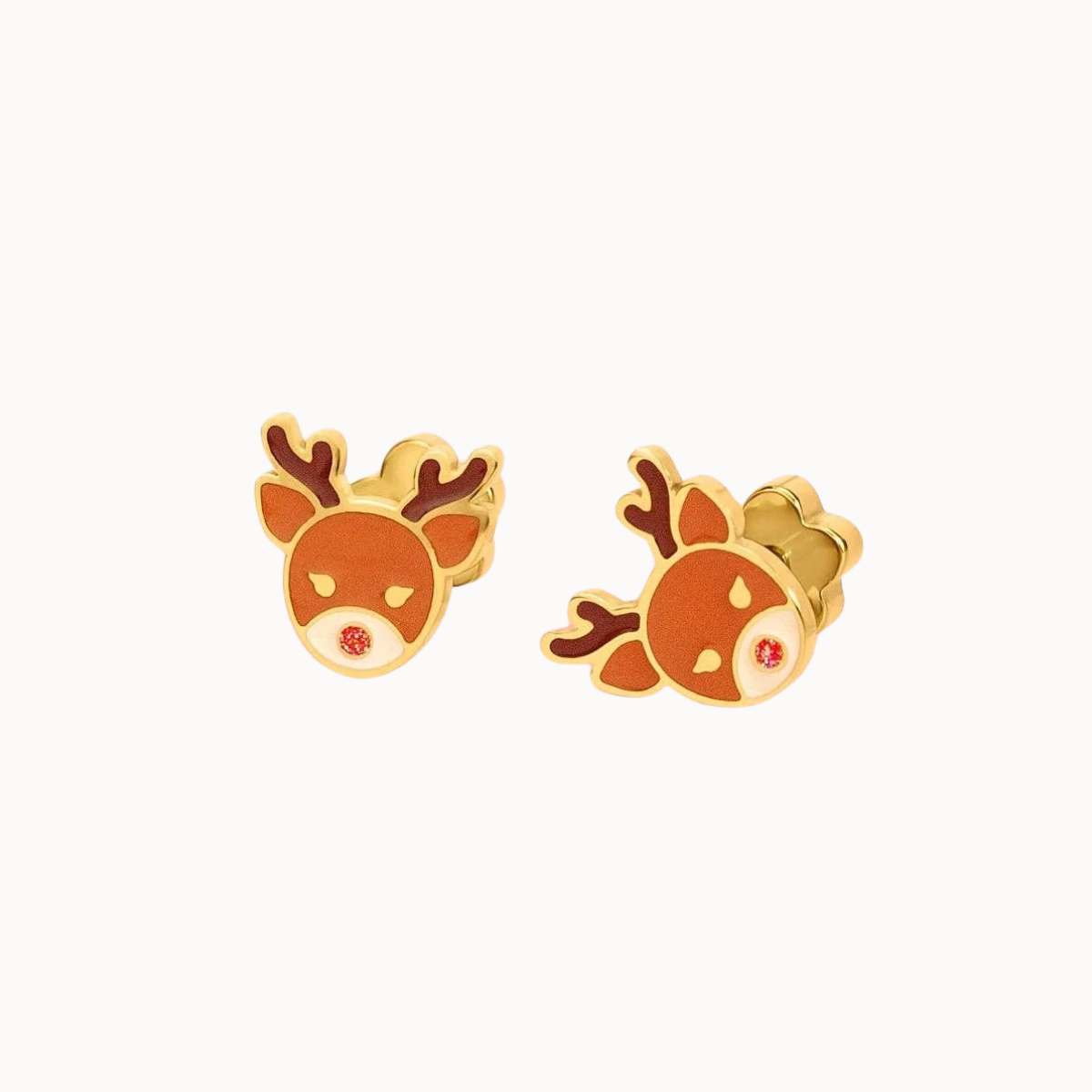 A pair of gold-toned stud earrings shaped like reindeer heads, featuring orange enamel faces with brown antlers and small red nose details, set against a plain off-white background.