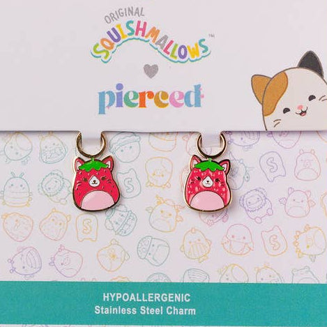 Squishmallows earrings on a branded card with a colorful background