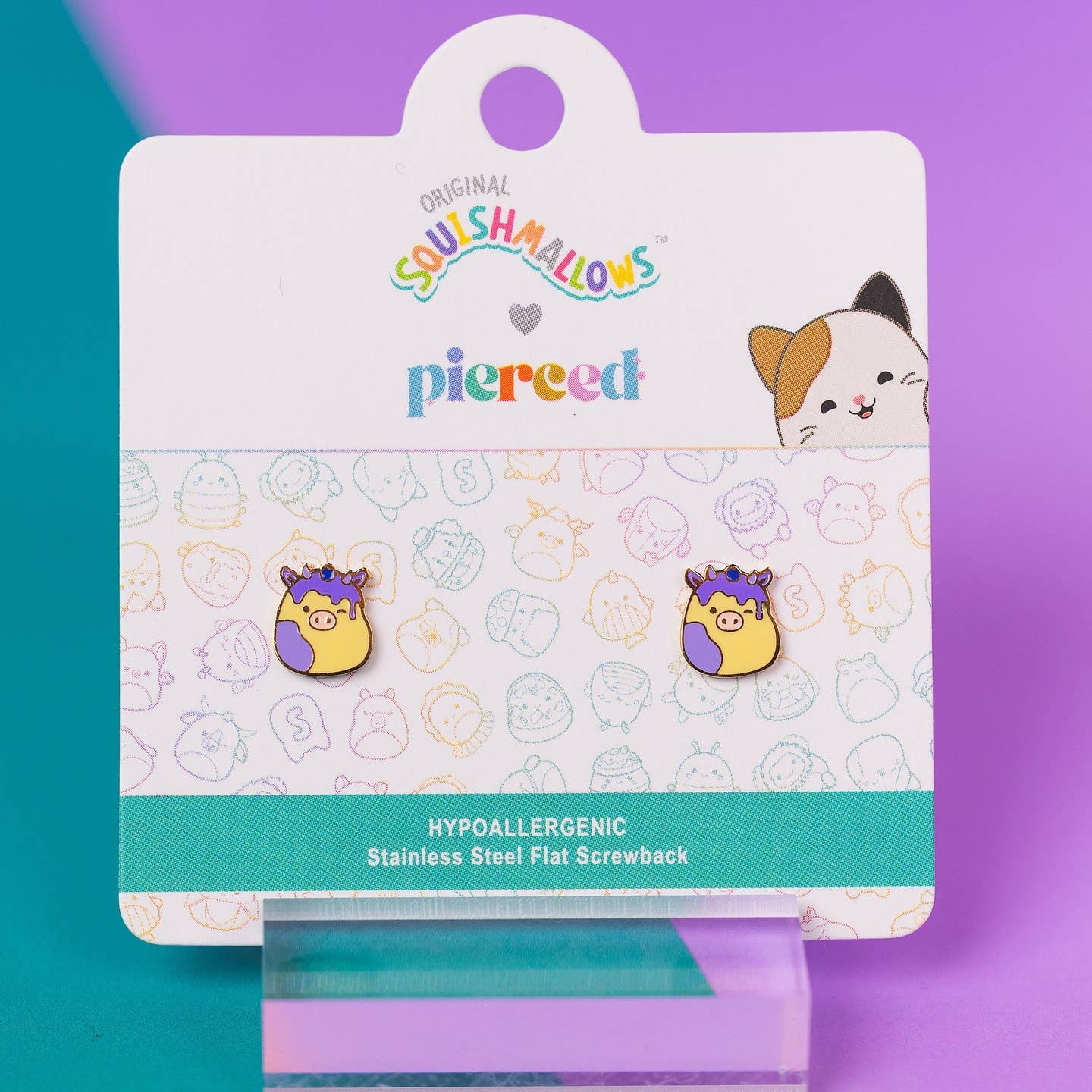 Squishmallows earrings on a branded card with a colorful background