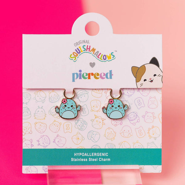Squishmallows earrings in packaging with pink and white background