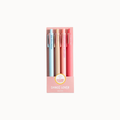 A set of four pastel-colored pens in a pink cardboard display box with the text 'DANCE LOVER' and a cupcake illustration, on a plain off-white background.