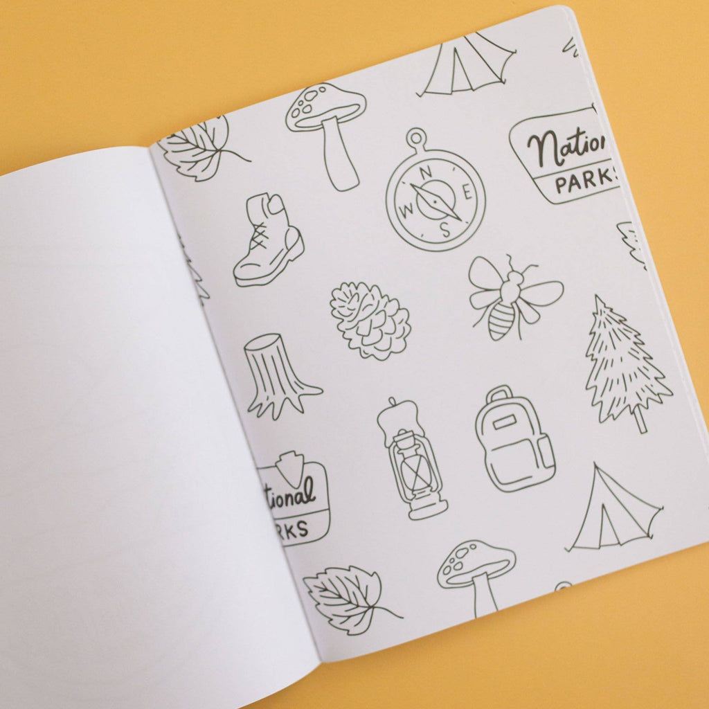 Open notebook with nature-themed line drawings on a yellow background