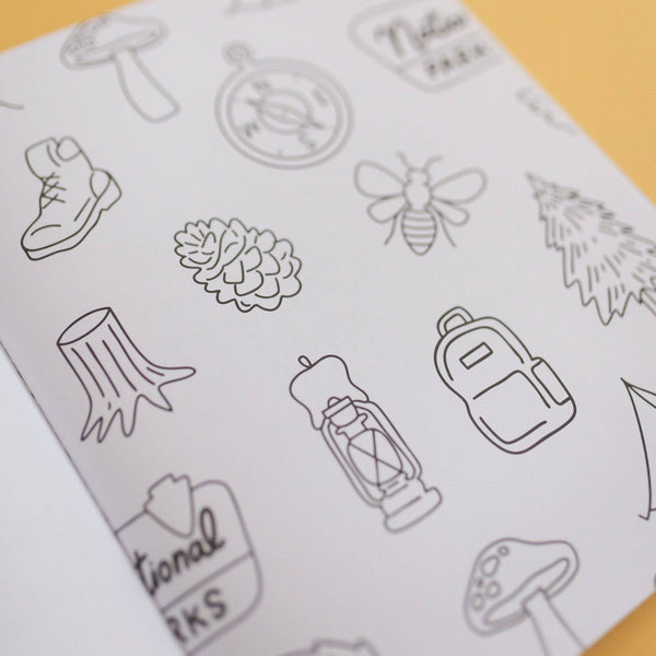Sheet of black line art stickers on a white background with various nature-themed designs.