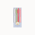 A boxed set of four slim pens in pastel colors: white, light green, coral pink, and peach. The pens are displayed in a clear window box with a lavender base and the brand name Nutcracker printed below.